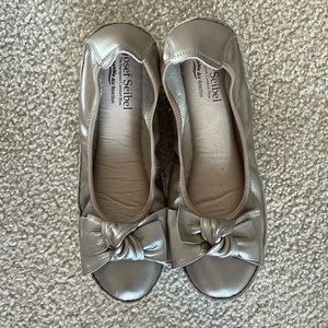 Cushioned flats. Size 38 . Shiny pink tinged metallic. Worn only once